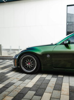 green-porsche-911-parked-on-parking-lot-during-daytime.jpg green porsche 911 parked on parking lot during daytime
